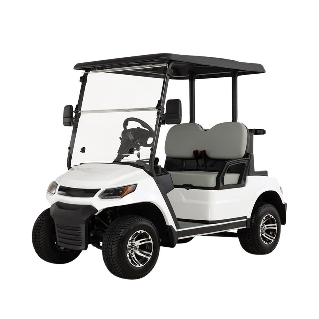 UAE golf cartz three-quarter front studio shot of a white four-seater golf cart with a black roof and a modern front design, set against a pure white background. This electric vehicle features light gray seats, a full windshield, and black lower trim. The golf cart is equipped with all-terrain tires and custom black and chrome wheels, highlighting its contemporary style and practicality.