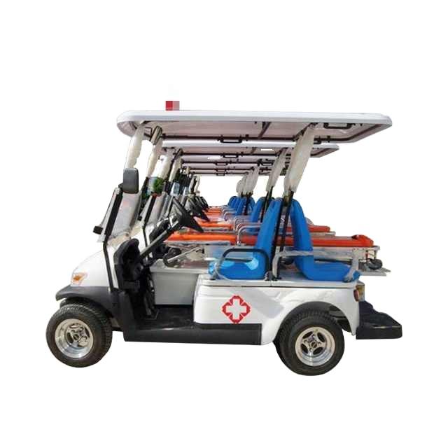 UAE golf cartz side view studio shot showing a line of multiple white electric ambulance golf carts receding into the distance against a white background. This image of medical utility vehicles in stock highlights the specialized rear section equipped with orange stretchers and blue backboards. Each emergency response cart has a red cross logo on the side and a white roof with a small red light.