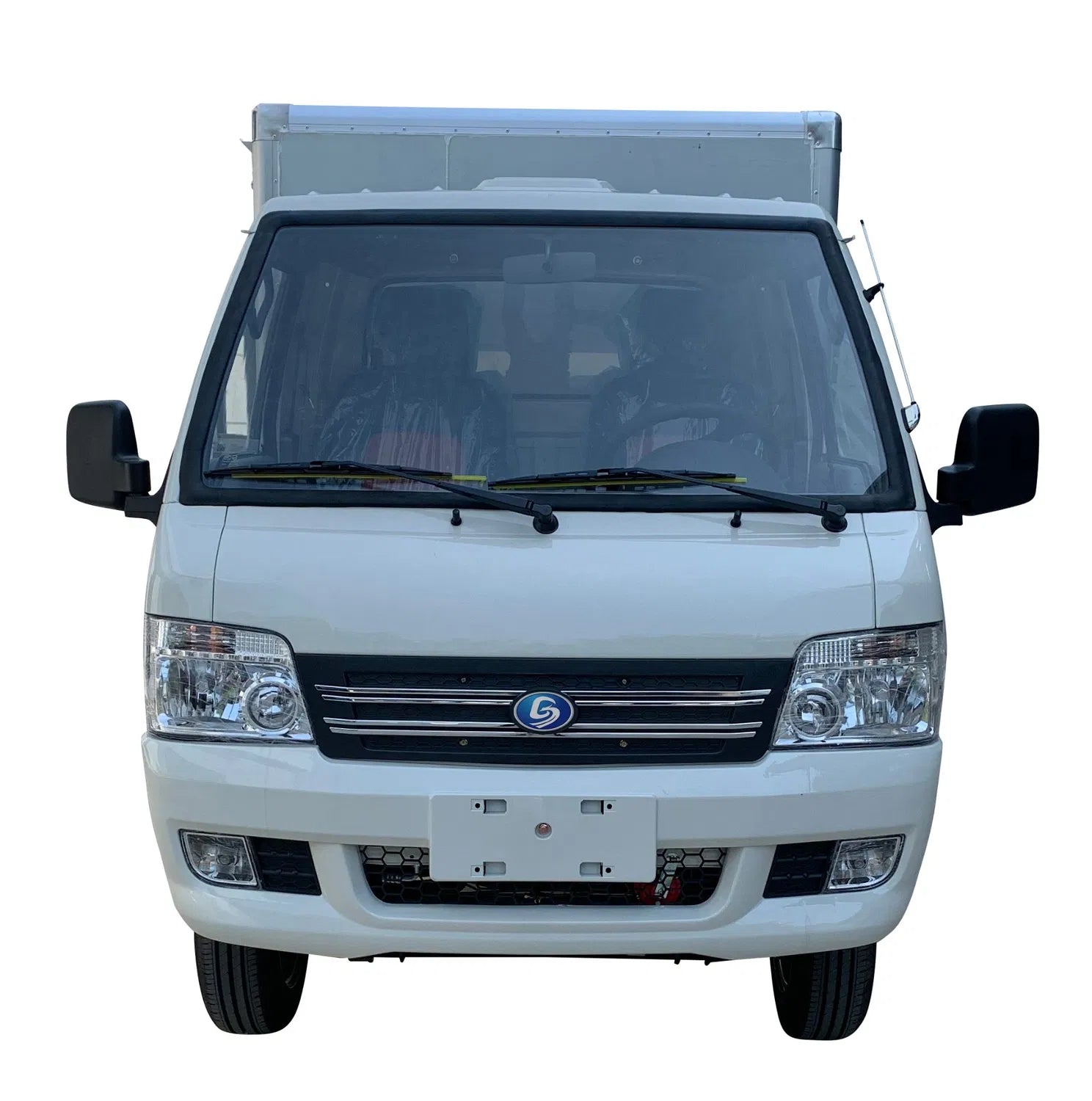 UAE golf cartz head-on studio shot of a white electric box truck with a single cab and an enclosed rear cargo area, set against a white background. This electric commercial utility vehicle is a compact electric mini truck or delivery van featuring a large windshield, twin headlights, a black grille, and front fog lights. The image highlights the professional front design of the electric work truck.