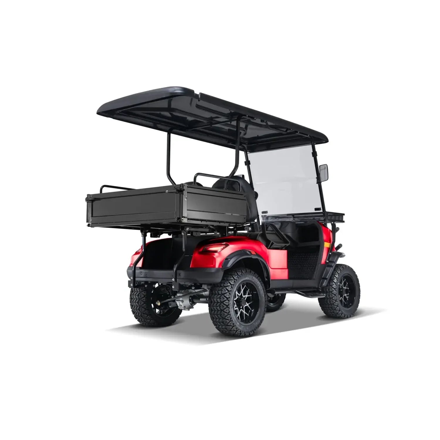 UAE golf cartz rear three-quarter studio shot of a red utility golf cart with a black roof and a black rear cargo bed that appears to be a dump or tilting box. This lifted off-road electric vehicle features a folding windshield and is equipped with large, knobby all-terrain tires on custom black and silver wheels. The image highlights the heavy-duty utility cart design for hauling and rugged terrain.
