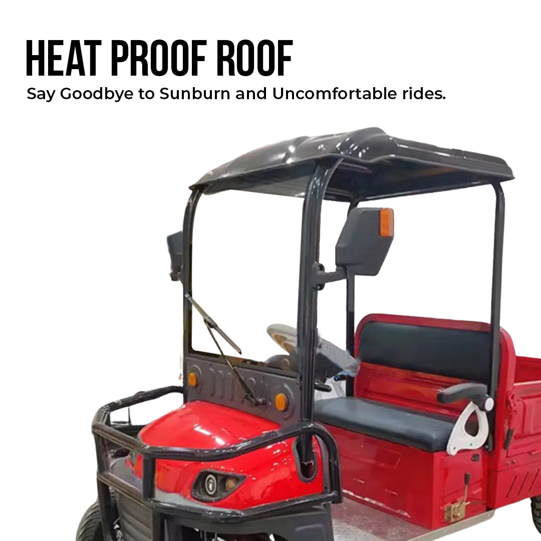 UAE golf cartz close-up promotional image highlighting the heat proof roof on a red utility electric vehicle with a flatbed. The shot focuses on the black roof and the driver's cabin, with text promoting the heat proof roof for comfort and sun protection. This view emphasizes the all-weather features of the two-seater work cart, including the black brush guard and small windshield wiper.
