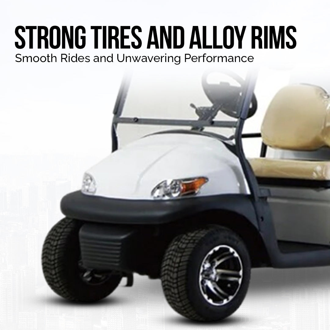 UAE golf cartz promotional image highlighting the strong tires and alloy rims of a white two-seater utility golf cart. The shot focuses on the front wheel and tire, which are fitted with a custom black and chrome rim. Text above the cart reads, "STRONG TIRES AND ALLOY RIMS" with the subtitle "Smooth Rides and Unwavering Performance," emphasizing the quality wheels and tires of this electric work cart.