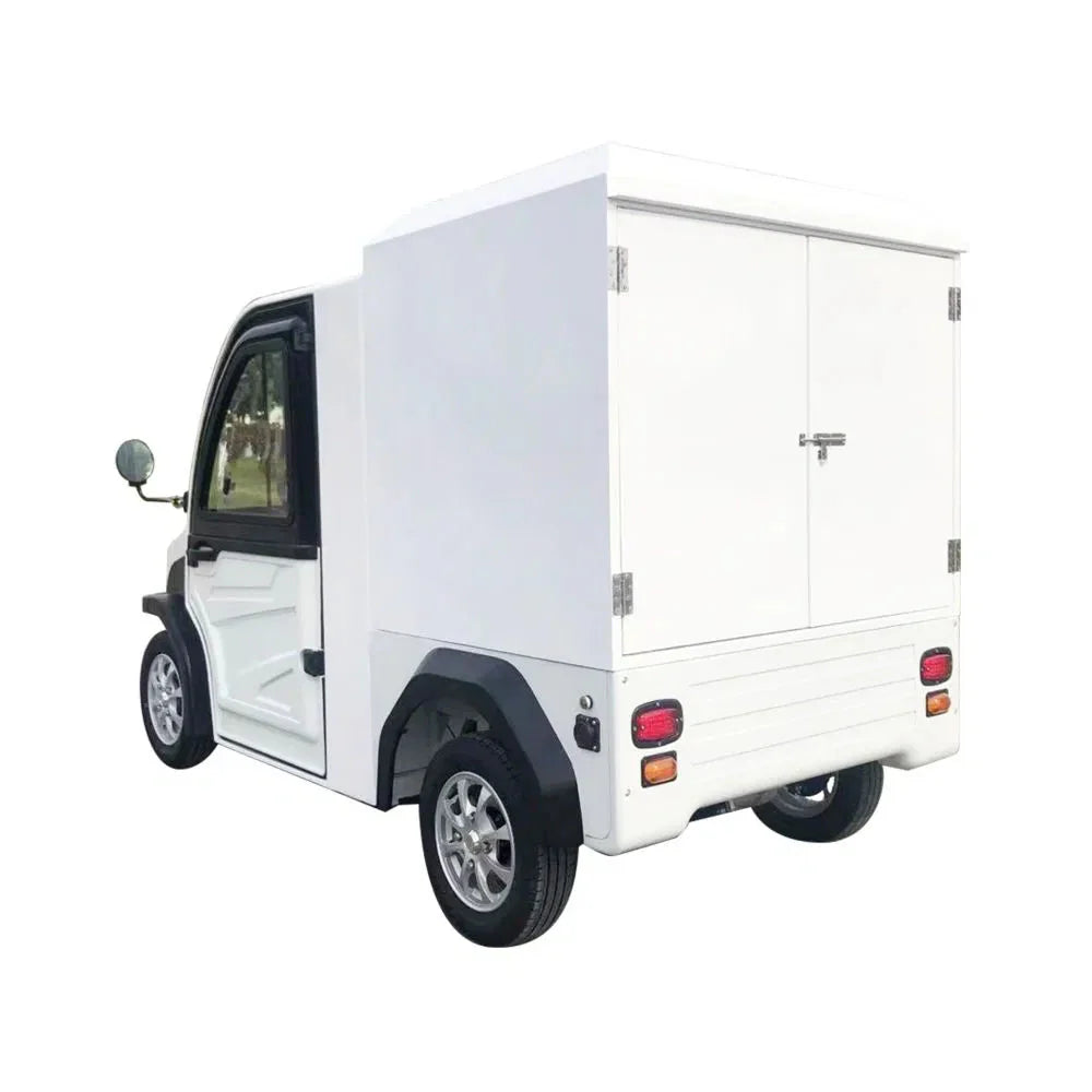 UAE golf cartz rear three-quarter studio shot of a white enclosed electric delivery vehicle with a large rear cargo box, set against a pure white background. This two-seater commercial NEV or electric utility truck features a securely locked rear door, black fender flares, and small, multispoke silver alloy wheels. The vehicle is designed for secure last-mile delivery and efficient urban logistics.