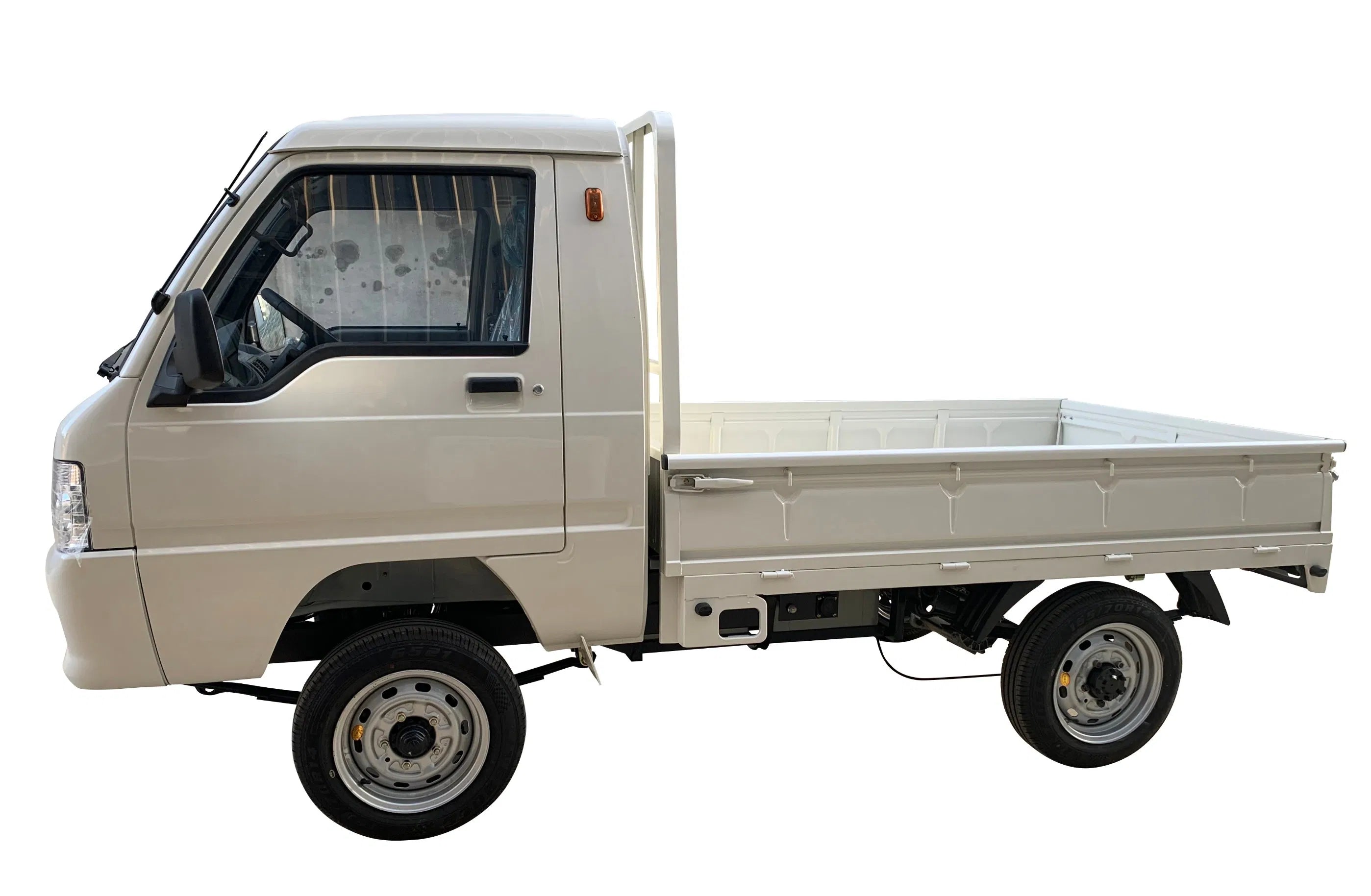 UAE golf cartz full side profile studio shot of a white electric flatbed truck with a single cab and a dropped-side cargo bed, set against a pure white background. This electric commercial utility vehicle is a compact electric mini truck or work truck designed for small-scale hauling and logistics. It features a simple, practical design with steel utility wheels.
