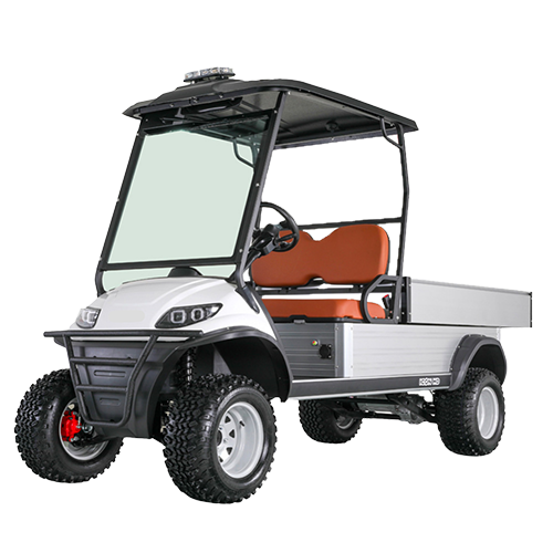 UAE golf cartz three-quarter front studio shot of a white utility electric vehicle with a black roof and a silver aluminum rear cargo bed, set against a transparent background. This specialized two-seater work cart features brown seats, a black brush guard, a large windshield, and a light bar on the roof. The lifted utility golf cart is equipped with knobby all-terrain tires on silver utility wheels, highlighting its heavy-duty property maintenance function.