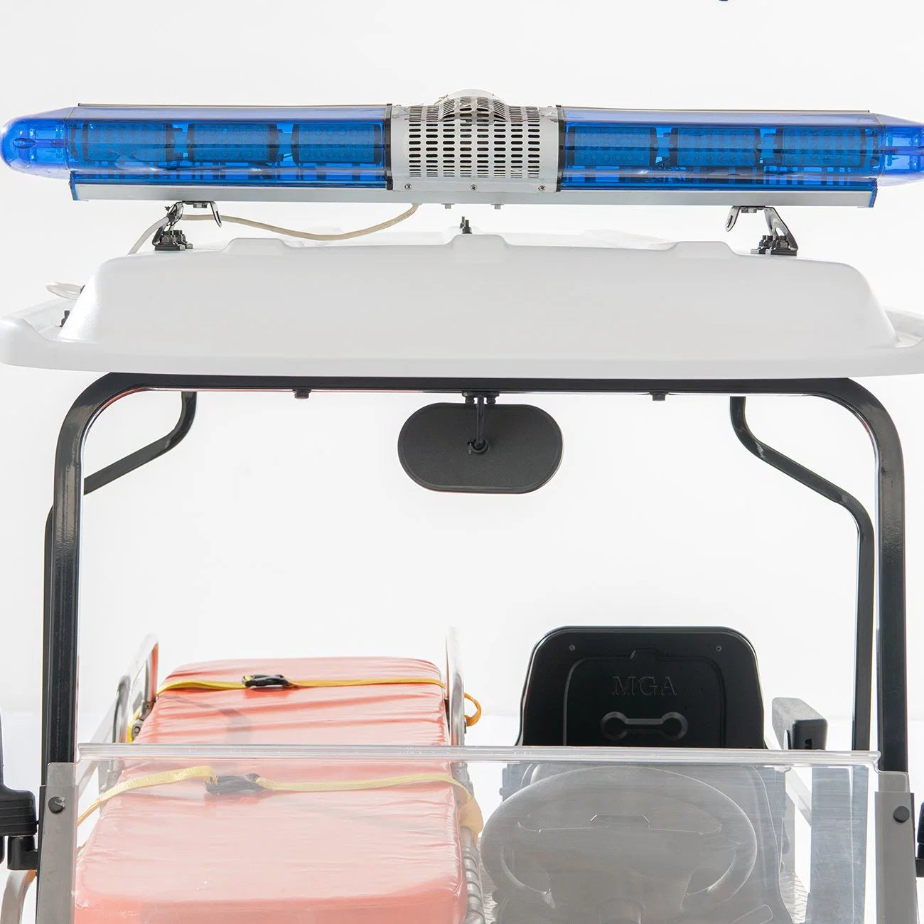 UAE golf cartz interior-facing close-up of the emergency light bar mounted on the white roof of an ambulance golf cart. The long, blue LED emergency light bar is prominently displayed. Below, the interior shows the top of the orange stretcher pad, the black driver's seat, the steering wheel, and the rear view mirror, emphasizing the essential equipment of this medical utility vehicle.
