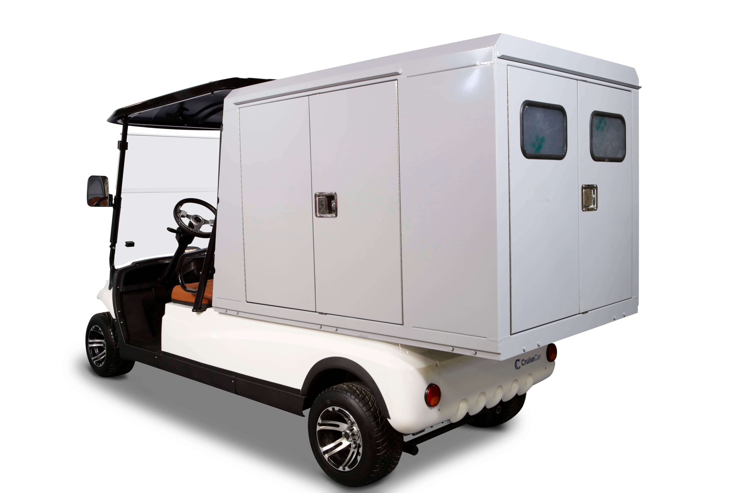 UAE golf cartz rear three-quarter studio shot of a white two-seater utility golf cart with a black roof, set against a pure white background. This specialized electric work cart features a very large, enclosed grey rear cargo box with side and rear double doors, and small rear windows. The cab area has brown seats and a steering wheel. The electric service vehicle is equipped with custom black and silver wheels, highlighting its maximum storage and delivery capacity.