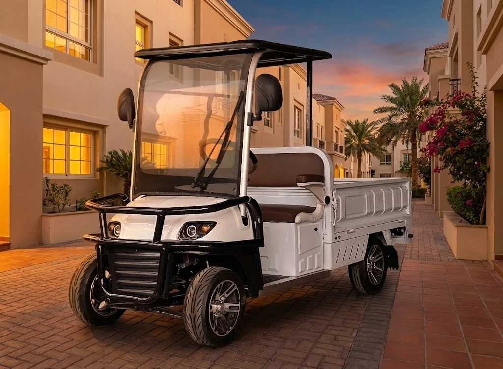 Golf cart on a paved street with buildings and palm trees in the background